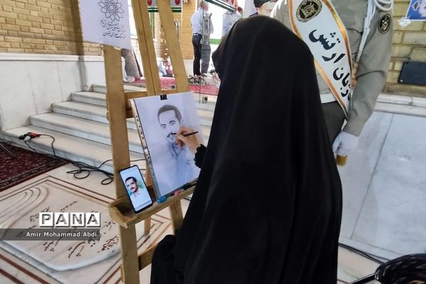 مراسم عطر افشانی وگلریزان مزار مطهر شهدای هشتم شهریور