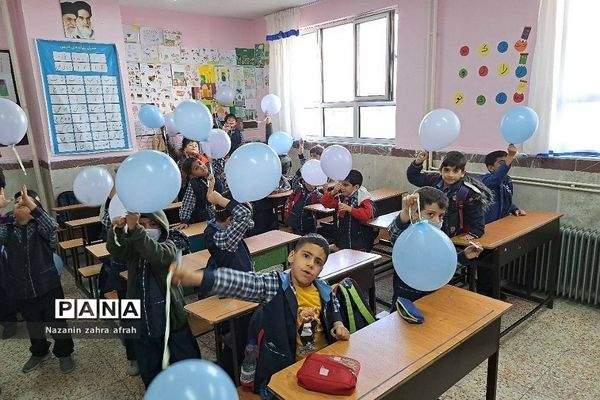 جشن آب در دبستان ایمان رودهن