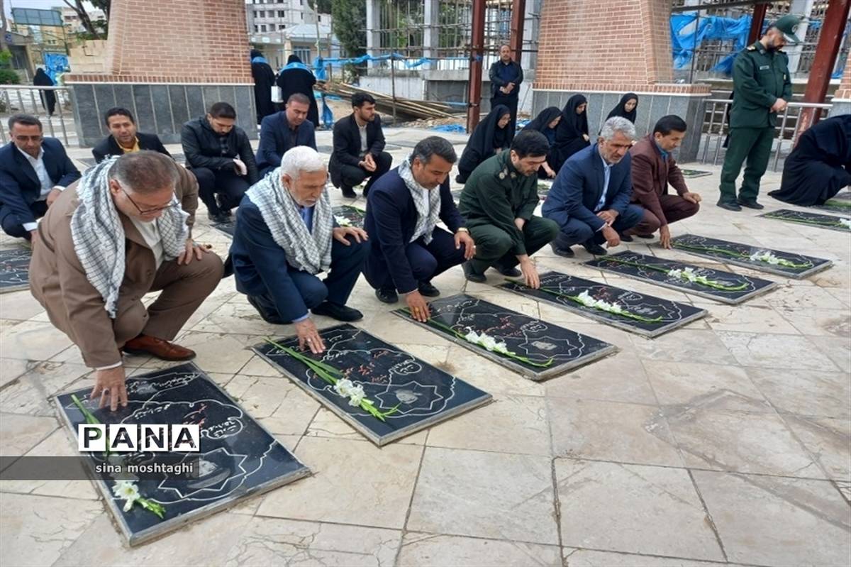 گل افشانی مزار شهدا به مناسبت هفته معلم