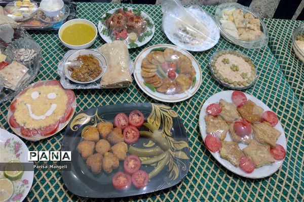 جشنواره صبحانه سالم در دبیرستان متوسطه اول توحید شهرستان خاتم