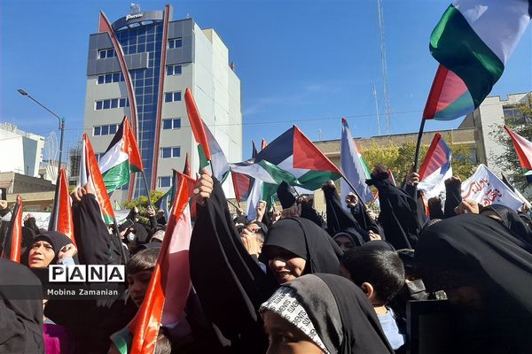 کودکان غزه در آغوش مادران جهان مقابل دفتر سازمان ملل در مشهد الرضا