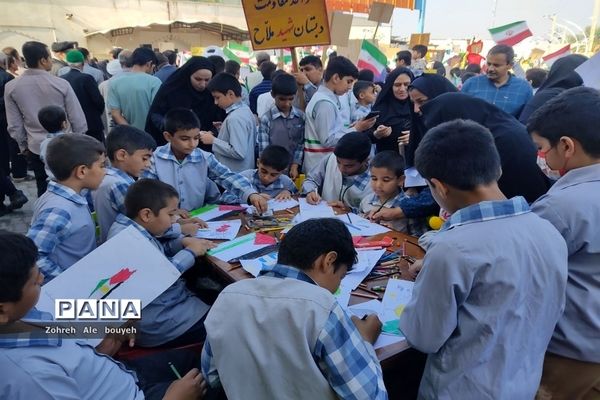 اجتماع دانش‌آموزان دبستان شهید ملاح خورموج در حمایت ازکودکان مظلوم غزه