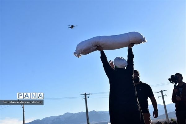 تشییع شهید گمنام در روستای احمد آباد بخش مرکزی بهاباد