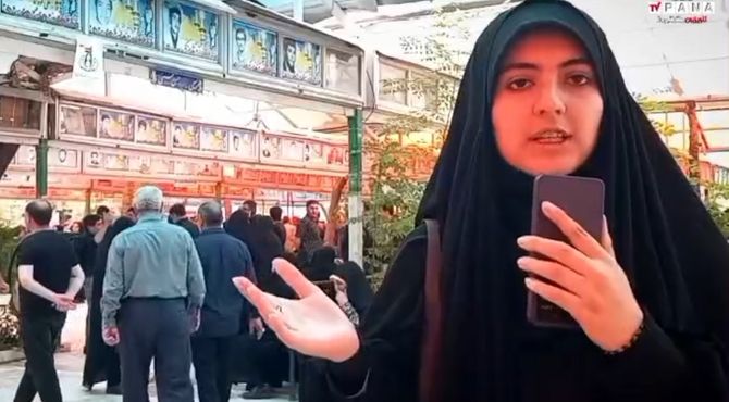 یک ایرانی تمام‌قد پای پرچمش ایستاده است