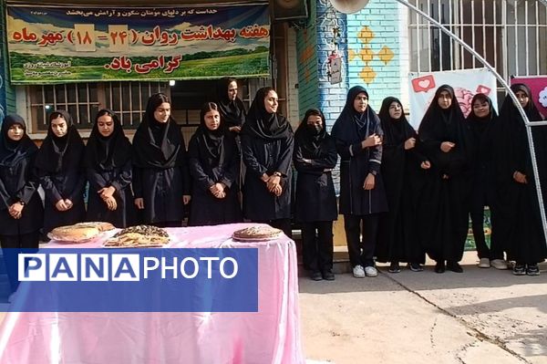 نواختن زنگ هفته سلامت روان در دبیرستان حضرت معصومه (س) شهرستان فیروزه