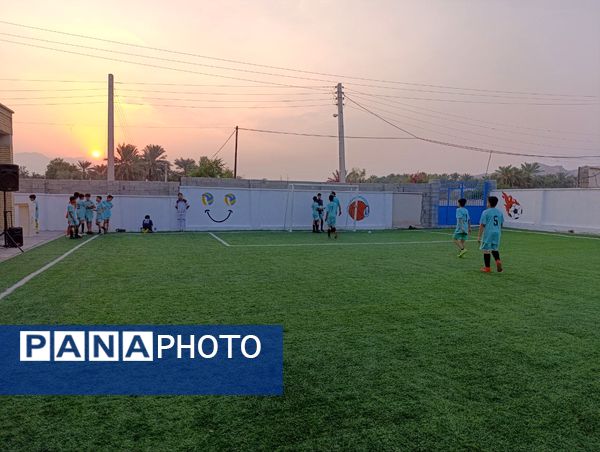 افتتاح زمین چمن مصنوعی آموزشگاه شهید مطهری مارم در فین
