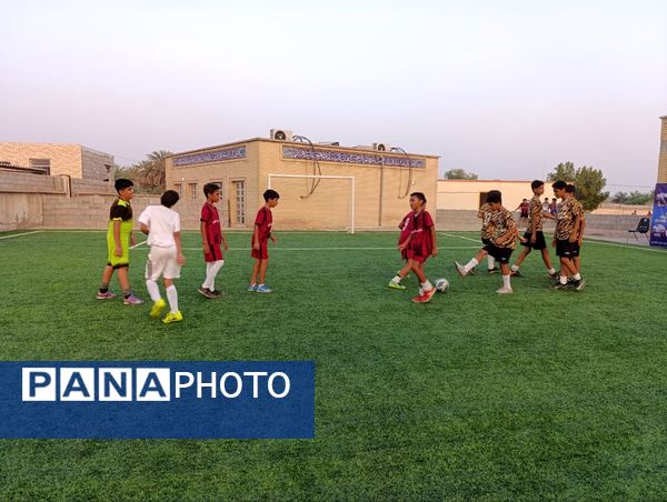 افتتاح زمین چمن مصنوعی آموزشگاه شهید مطهری مارم در فین