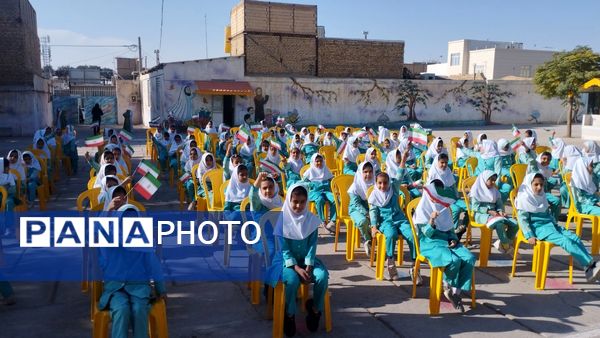 نواختن زنگ هفته کتاب و کتابخوانی در مدرسه شهید نجفیان