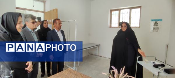 نواختن زنگ سلامت در مدرسه دخترانه ضحی ۱ شهرستان شیروان