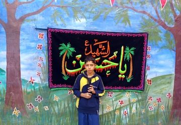 استقبال معنوی دانش آموزان دبستان ندای قرآن از شهید گمنام