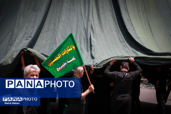 خیمه‌سوزان ظهر عاشورا در چهارراه گلوبندک تهران