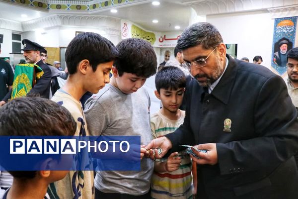 پرچم متبرک امام رضا (ع) در جشن ولادت امام رئوف در مسجد امام حسن عسکری (ع) بجنورد 