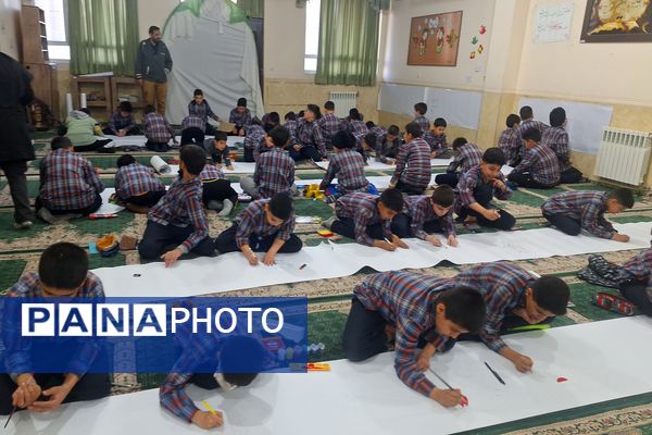 برپایی نقاشی همگانی در هفته ماها در آموزشگاه معارف۶ ناحیه ۳شیراز 