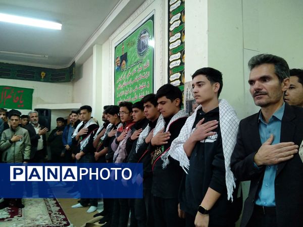 مراسم وداع با شهید گمنام در هنرستان کشاورزی شهید مطهری در شهرستان خلیل‌آباد