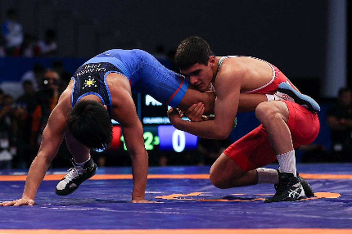 حاجمولامحمدی با شکست کشتیگیر هندی به مدال طلا رسید