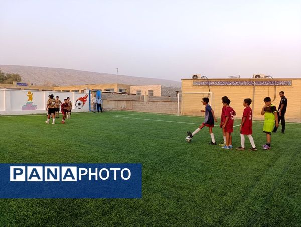 افتتاح زمین چمن مصنوعی آموزشگاه شهید مطهری مارم در فین