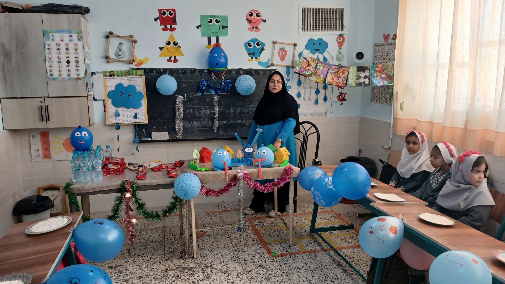 جشن آب‌‌ در‌ دبستان‌ شهید‌ دیالمه‌