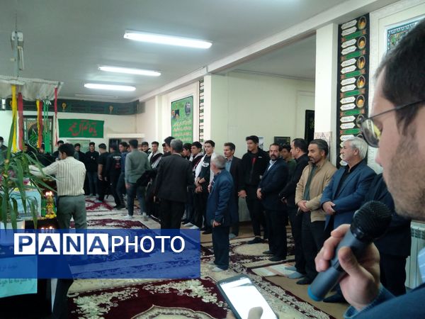 مراسم وداع با شهید گمنام در هنرستان کشاورزی شهید مطهری در شهرستان خلیل‌آباد