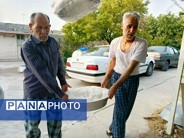 پخت و توزیع نذری در روز تاسوعای حسینی روستای حسن آباد داراب استان فارس