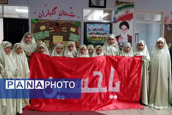 پرچم متبرک امام حسین(ع) میهمان دانش‌آموزان مدرسه زنده‌یاد قمصری