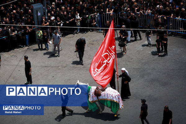 خیمه‌سوزان ظهر عاشورا در چهارراه گلوبندک تهران