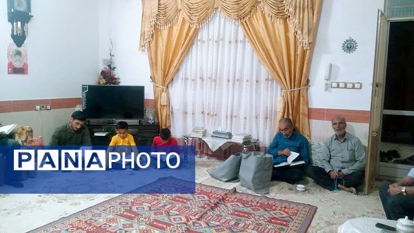 مراسم قرائت قرآن و تجلیل از مادر شهید در روستای بزنجرد خلیل آباد