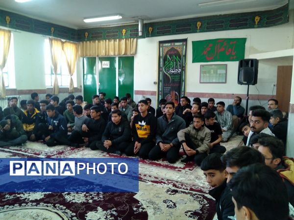مراسم وداع با شهید گمنام در هنرستان کشاورزی شهید مطهری در شهرستان خلیل‌آباد