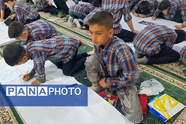 برپایی نقاشی همگانی در هفته ماها در آموزشگاه معارف۶ ناحیه ۳شیراز 