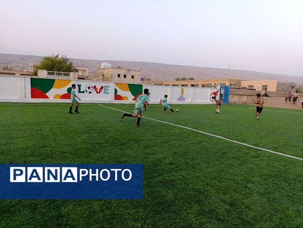 افتتاح زمین چمن مصنوعی آموزشگاه شهید مطهری مارم در فین