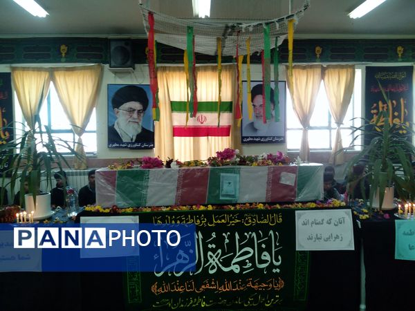 مراسم وداع با شهید گمنام در هنرستان کشاورزی شهید مطهری در شهرستان خلیل‌آباد