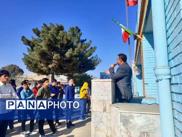 زنگ آغاز هفته بسیج  دانش آموزی در دبیرستان شاهد ابوذر غفاری نیشابور 