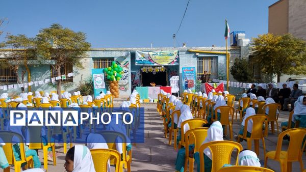 نواختن زنگ هفته کتاب و کتابخوانی در مدرسه شهید نجفیان