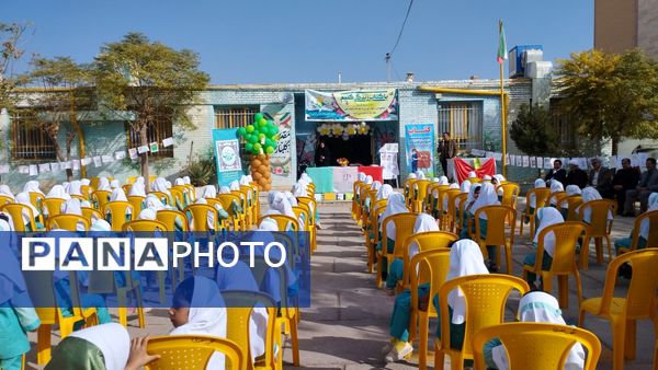 نواختن زنگ هفته کتاب و کتابخوانی در مدرسه شهید نجفیان