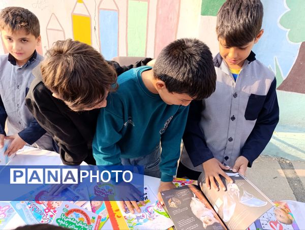 برگزاری نمایشگاه کتاب در دبستان معلم دو آشخانه 