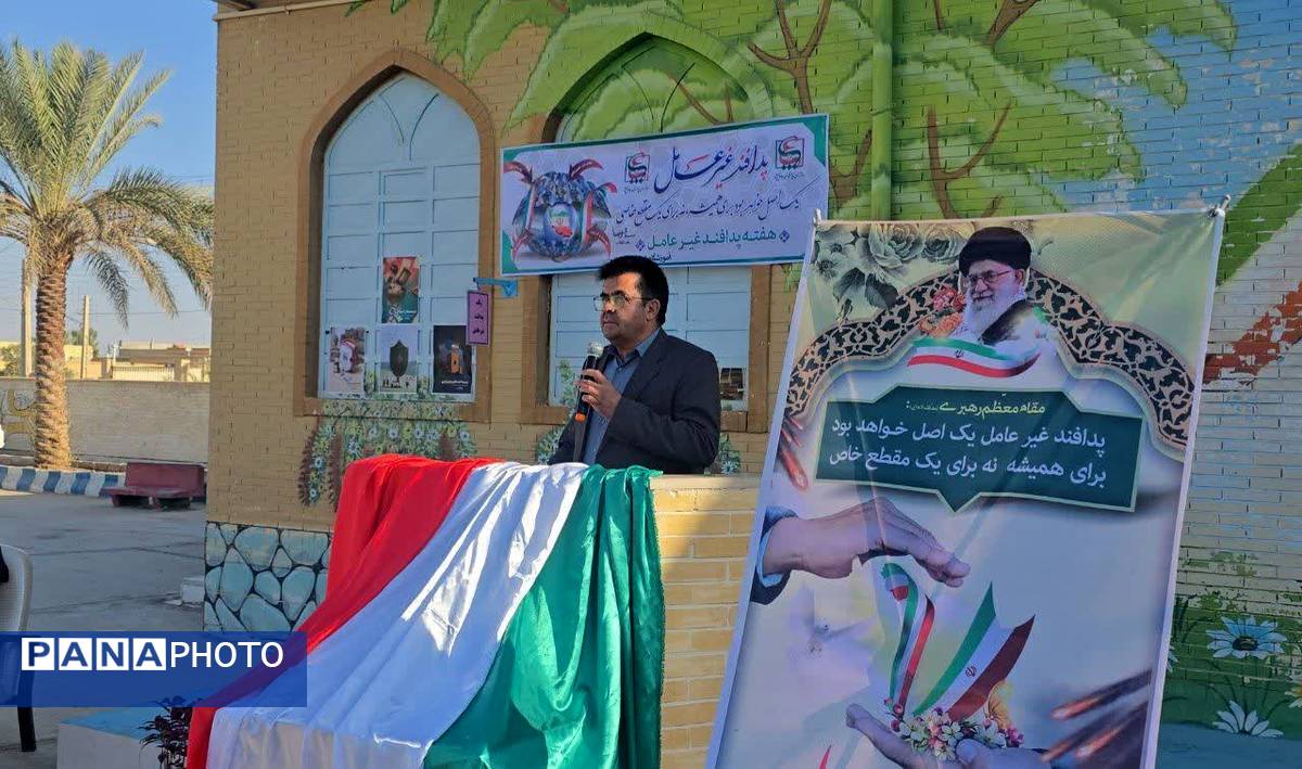 مراسم نمادین نواختن زنگ پدافند غیرعامل در دبستان شهید دهستانی بافق