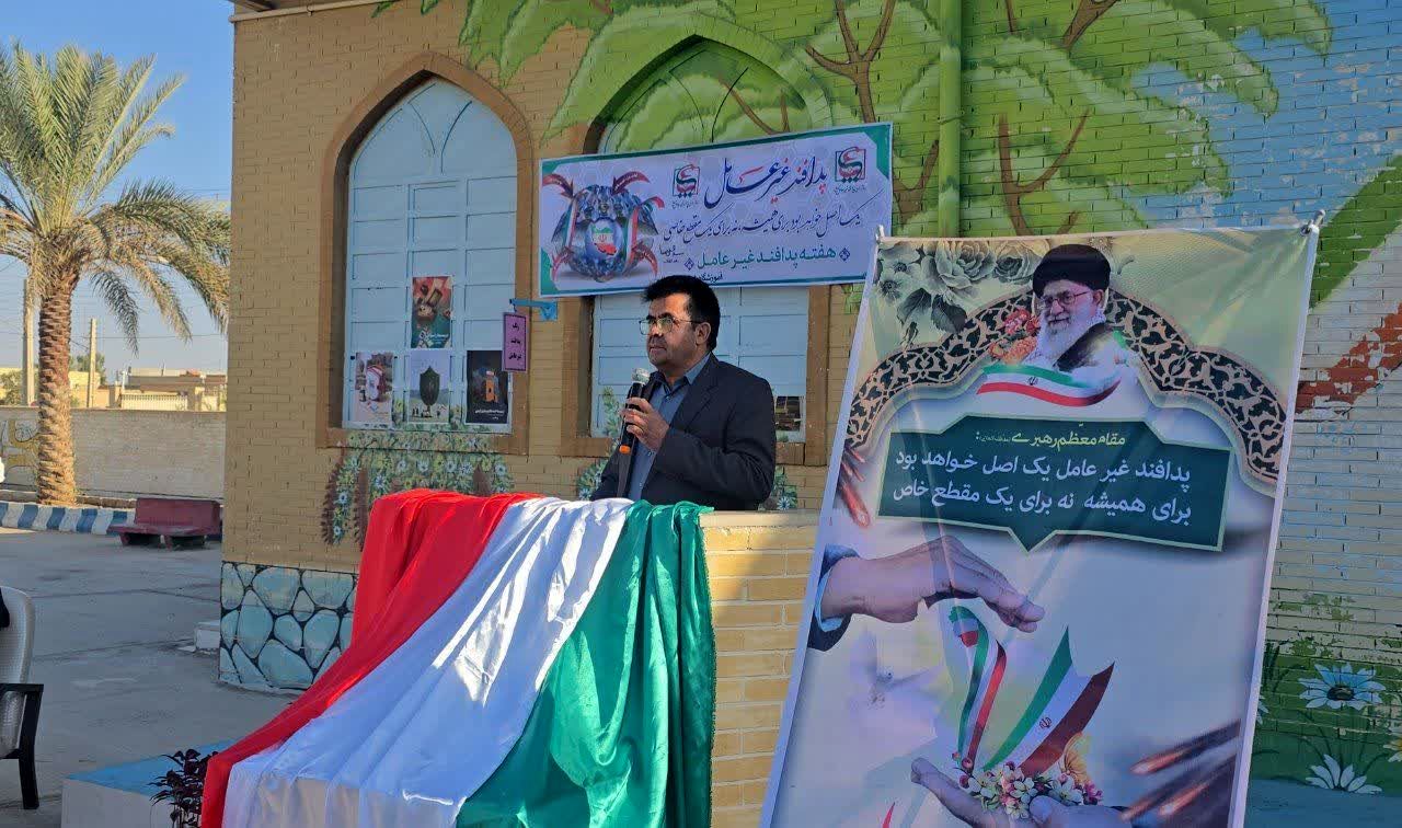 مراسم نمادین نواختن زنگ پدافند غیرعامل در دبستان شهید دهستانی بافق