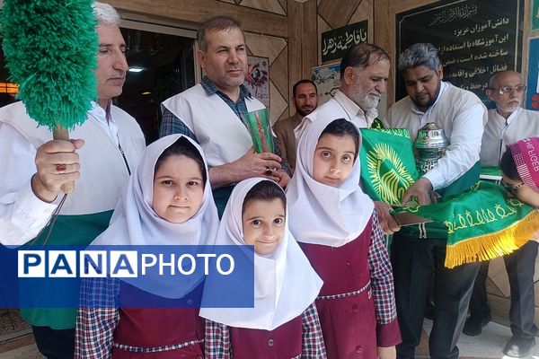 مراسم  پرچم گردانی  بارگاه حضرت علی بن موسی‌الرضا (ع) در مدرسه باهنر ملارد به مناسبت دهه کرامت