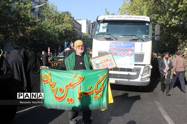 وداع باشکوه عزاداران حسینی با پیکر مطهر شهیدان هشت سال دفاع مقدس