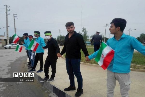 زنجیره انسانی هنرجویان هنرستان سعادت شبانکاره  بوشهر  در پی حمایت از سپاه پاسداران انقلاب اسلامی ایران