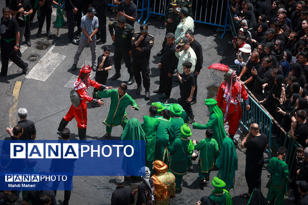 خیمه‌سوزان ظهر عاشورا در چهارراه گلوبندک تهران