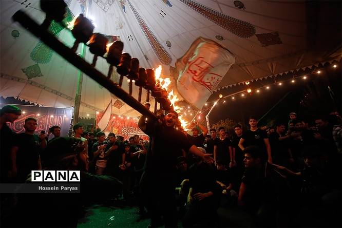 آیین مشعل‌گردانی در دولت‌آباد تهران