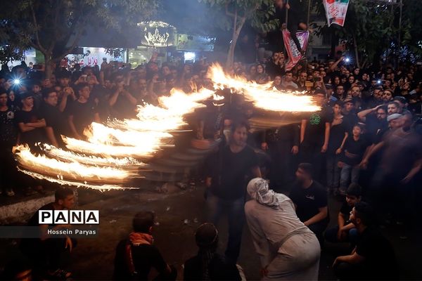 آیین مشعل‌گردانی در دولت‌آباد تهران