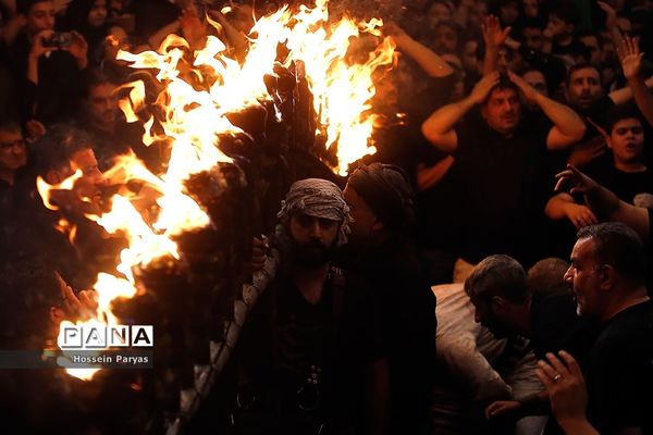 آیین مشعل‌گردانی در دولت‌آباد تهران