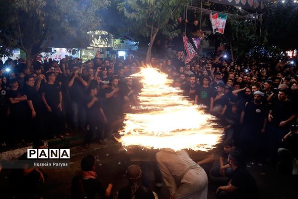 آیین مشعل‌گردانی در دولت‌آباد تهران