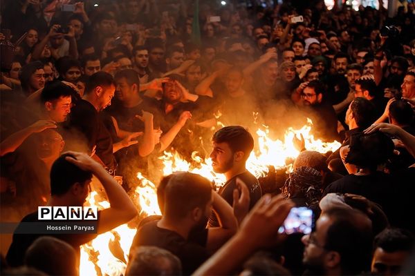 آیین مشعل‌گردانی در دولت‌آباد تهران