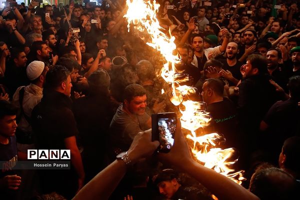 آیین مشعل‌گردانی در دولت‌آباد تهران