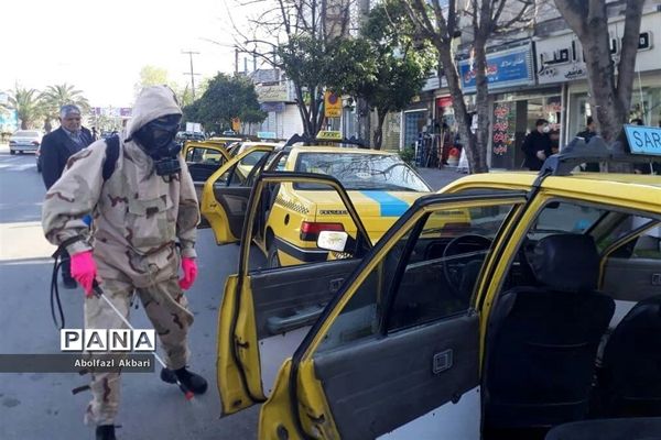 ضدعفونی کردن معابر و اماکن شهری در ساری