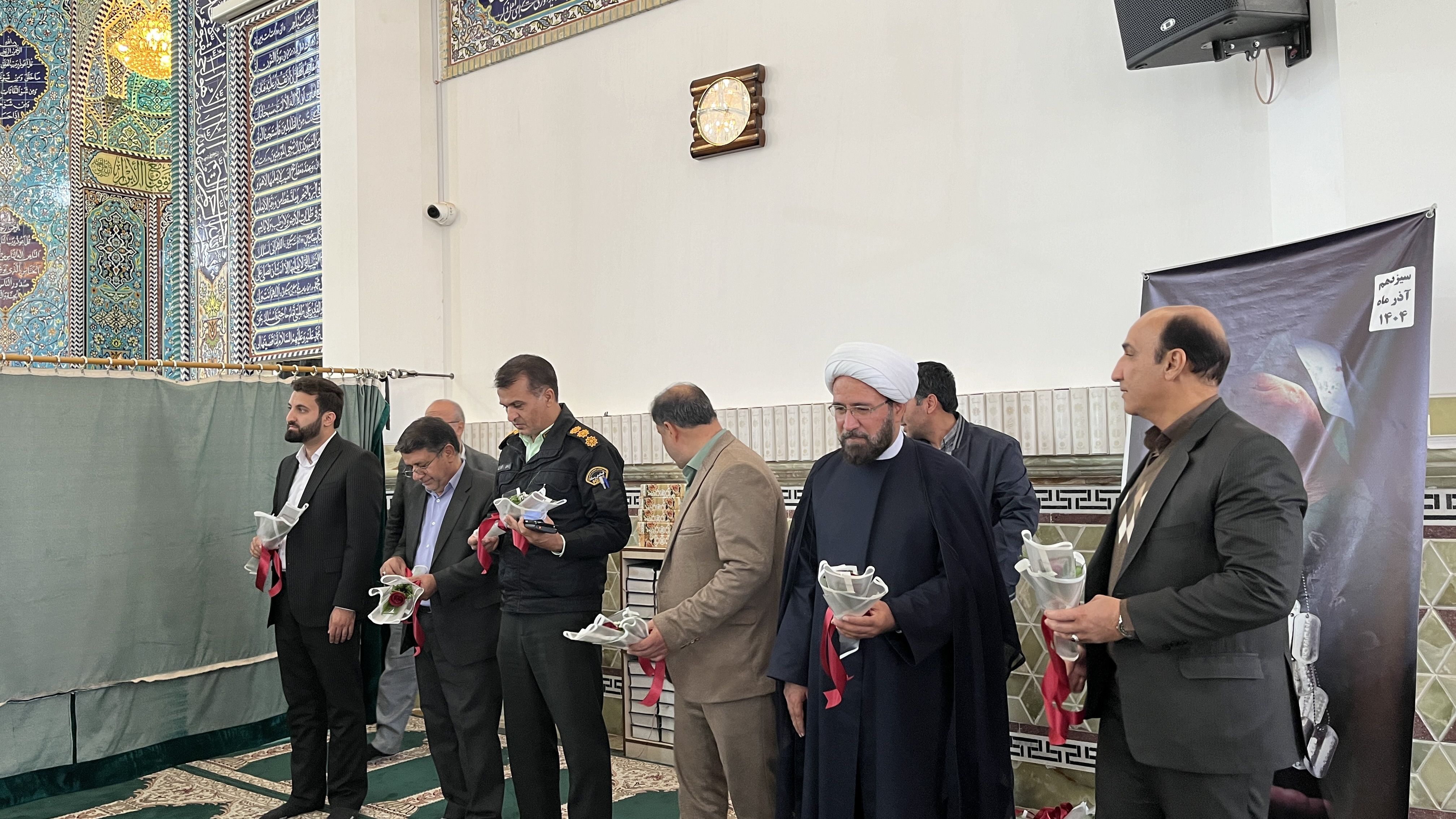 تکریم مادران و همسران شهدا و تجلیل از برگزیدگان مسابقات در نماز جمعه اشکذر 