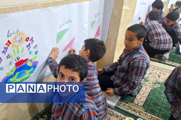 برپایی نقاشی همگانی در هفته ماها در آموزشگاه معارف۶ ناحیه ۳شیراز 