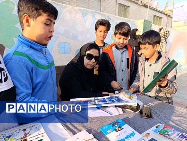 برگزاری نمایشگاه کتاب در دبستان معلم دو آشخانه 